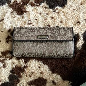 Lion printed Anne Klein clutch with coin compartment in back